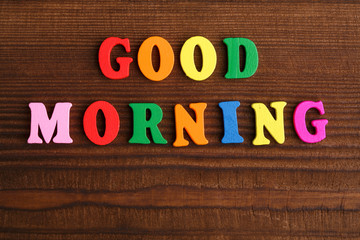 Wooden letters. Inscription good morning. Bright colored letters.