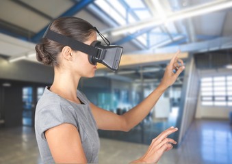 Fototapeta premium Woman using virtual reality headset
