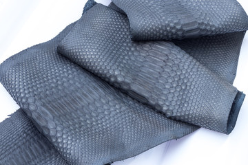 Genuine python snakeskin leather, snake skin, texture background.