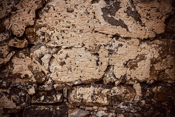 Dirty, scratched old brick wall