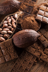 Bars Chocolate , candy sweet, dessert food on wooden background