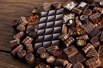 Praline Chocolate on wooden backgroud