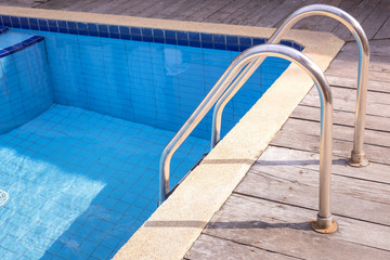 Swimming pool with wooden deck