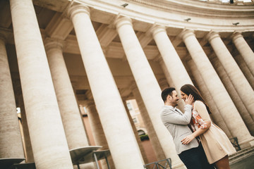 Loving couple at the St. Peter's Square in Vatican