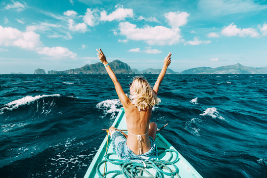 Woman travelling on the boat in Asia