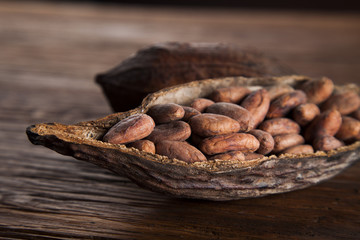Cocoa pod on wooden table