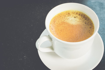 Cup of coffee - freshly brewed espresso.