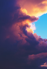 Close up image of big storm cloud at sunset
