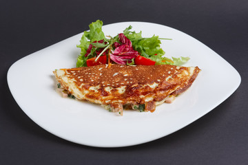 omelet with ham and vegetables