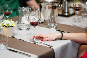 Delicious grilled steak on plate with glass of wine