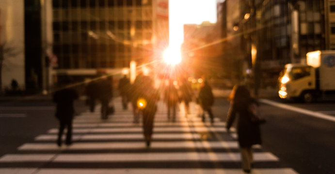 People on street with beautiful morning light, Tokyo, Japan.