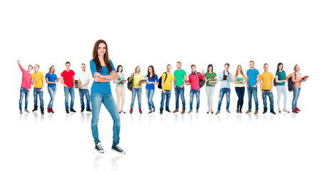 Large group of teenage students isolated on white background. Many different people standing together. School, education, college, university concept.