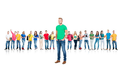 Large group of teenage students isolated on white background. Many different people standing together. School, education, college, university concept.