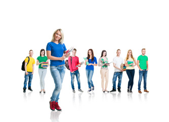 Obraz premium Large group of teenage students isolated on white background. Many different people standing together. School, education, college, university concept.