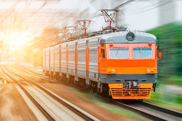 Passenger electric train rides speed railway wagons journey light