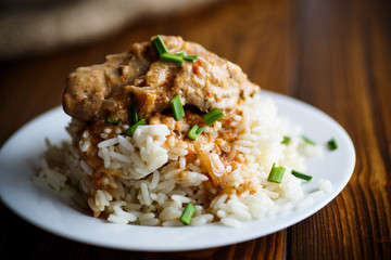 Boiled rice with rabbit meat and sauce