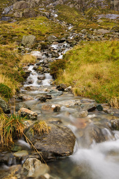A small mountain stream on the Cwm Idwal track in the Snowdonia National Park in North Wales. Shot with a long exposure to accentuate the flow of the water