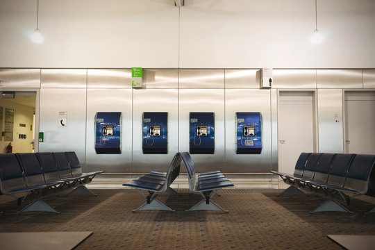 Empty airport terminal waiting area with chairs in Athens airport