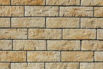The texture in the brickwork with yellow brick