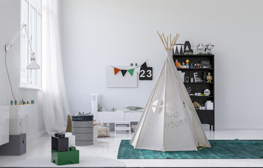 Small white wigwam or tepee in a kids nursery © XtravaganT