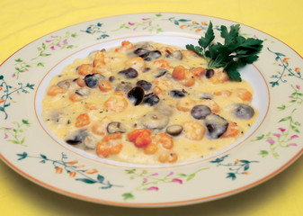 Collybia esculenta mushrooms with shrimp and parsley