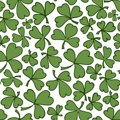 St Patrick's Day Clover seamless pattern. Green doodle clover leaves on white background. Illustration for lucky spring design with shamrock. Ireland symbol pattern. Irish decor for web site