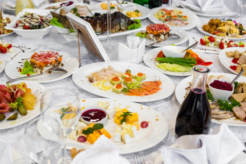 Appetizer caviar and fish. Sandwich with sea salmon and red caviar