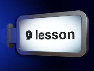 Education concept: Lesson and Head With Keyhole on billboard background