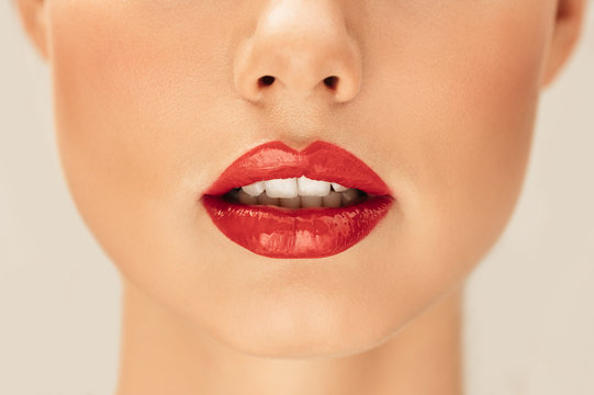 Fototapeta Beautiful lips of a young woman