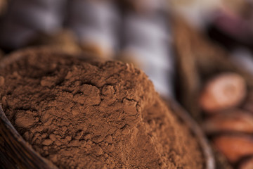 Chocolate sweet, cocoa pod and food dessert background
