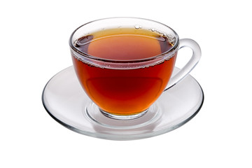 Transparent glass cup of tea and a saucer isolated on white background