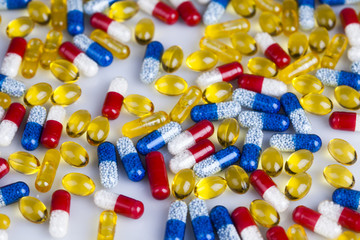 Closeup of medical capsule, healthy background