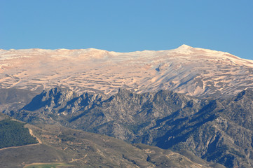 Naklejka premium snowy summits colored by the dust of the Sahara desert
