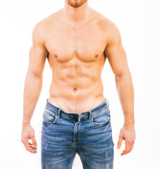 Muscular young man wearing jeans Isolated on white background.