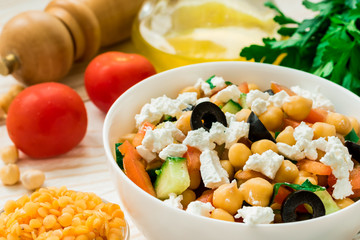 Vegetarian chickpea greek salad and red lentil