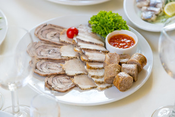Meat cutting the wedding table. Fat meat slices texture.