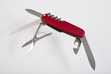 Red multitool open knife isolated