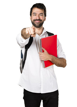 Student man pointing to the front