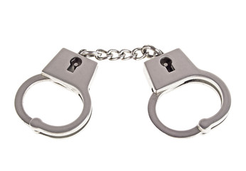 Silver handcuffs on white background