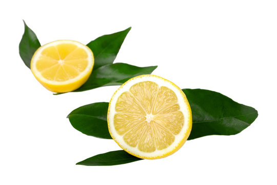 juicy lemon with leaves isolated on white background