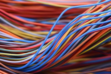 Closeup of cable and wire in computer network systems - Powered by Adobe
