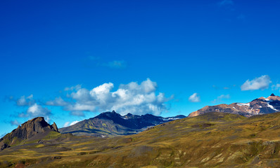 Travel to Iceland. Beautiful Icelandic landscape with mountains, sky and clouds. Trekking in national park Landmannalaugar