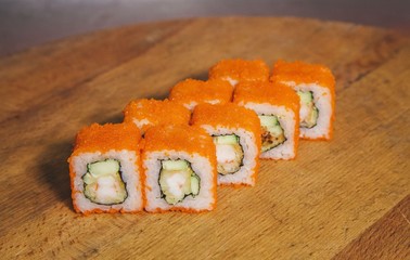 sushi on a wooden tray