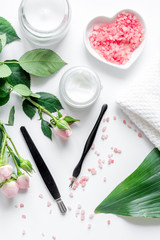 salt and cream for nail care in spa top view