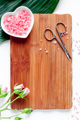 salt and cream for nail care in spa top view