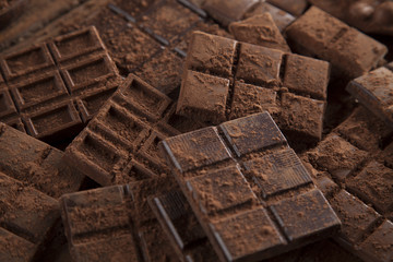 Chocolate bar, candy sweet, dessert food on wooden background