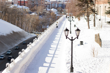 Street under snow - cute winter scene in the daytime