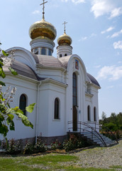 Fototapeta na wymiar Church with Golden domes