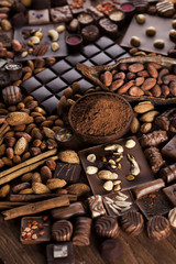 Aromatic cocoa, powder and Dark chocolate background