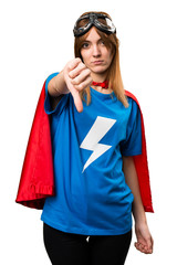 Pretty superhero girl making bad signal